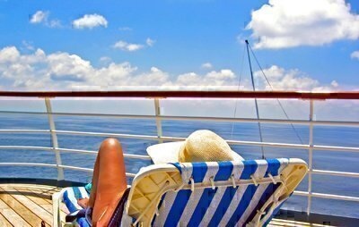 person in a cruise ship deck chair