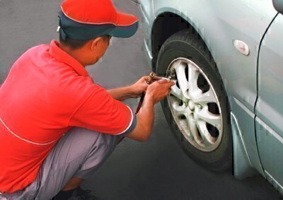 checking tire pressure